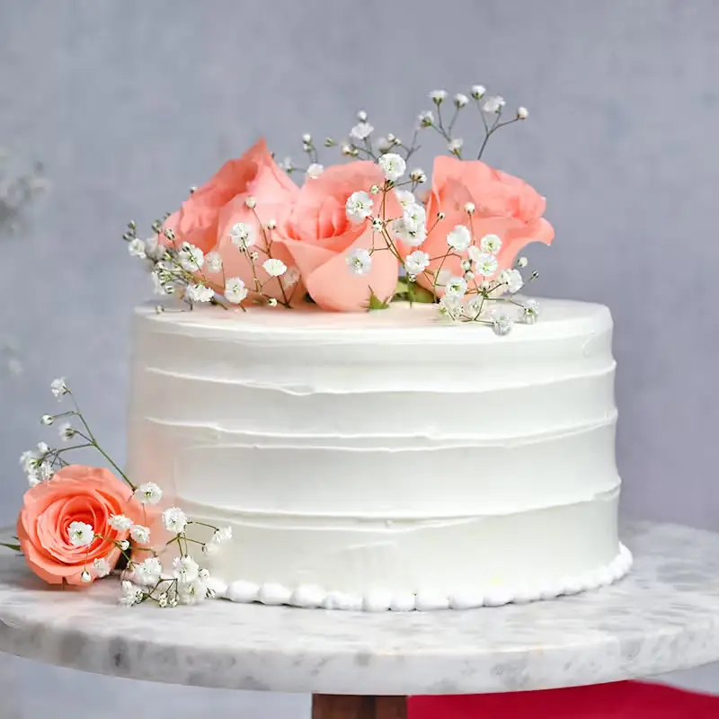 whitenpinkbloomscake9855840caA0